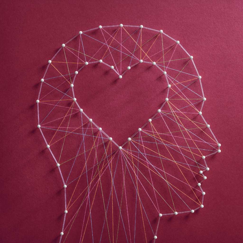 Illustration of a heart inside a brain, symbolizing the emotional connections built through local events at hardware stores. The heart represents the bond and anticipation created with customers, while the brain highlights thoughtful planning and strategy behind hosting community events.