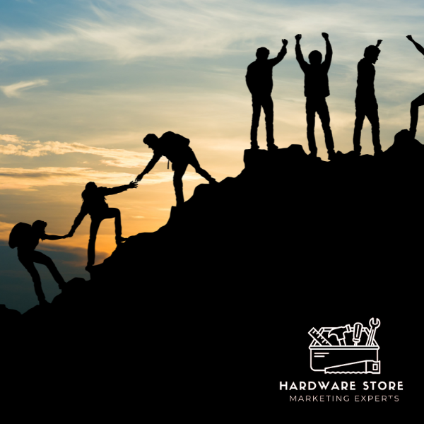 An illustration of people helping each other climb a mountain, symbolizing teamwork and community support. One person is reaching down to help another up, representing collaboration and overcoming challenges together. The background features a scenic view of the mountain, emphasizing the journey and effort it takes to succeed, much like a hardware store working to keep its customers engaged and thriving during tough times.
