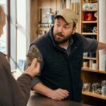Customer and employee talking across the counter at an independent hardware store