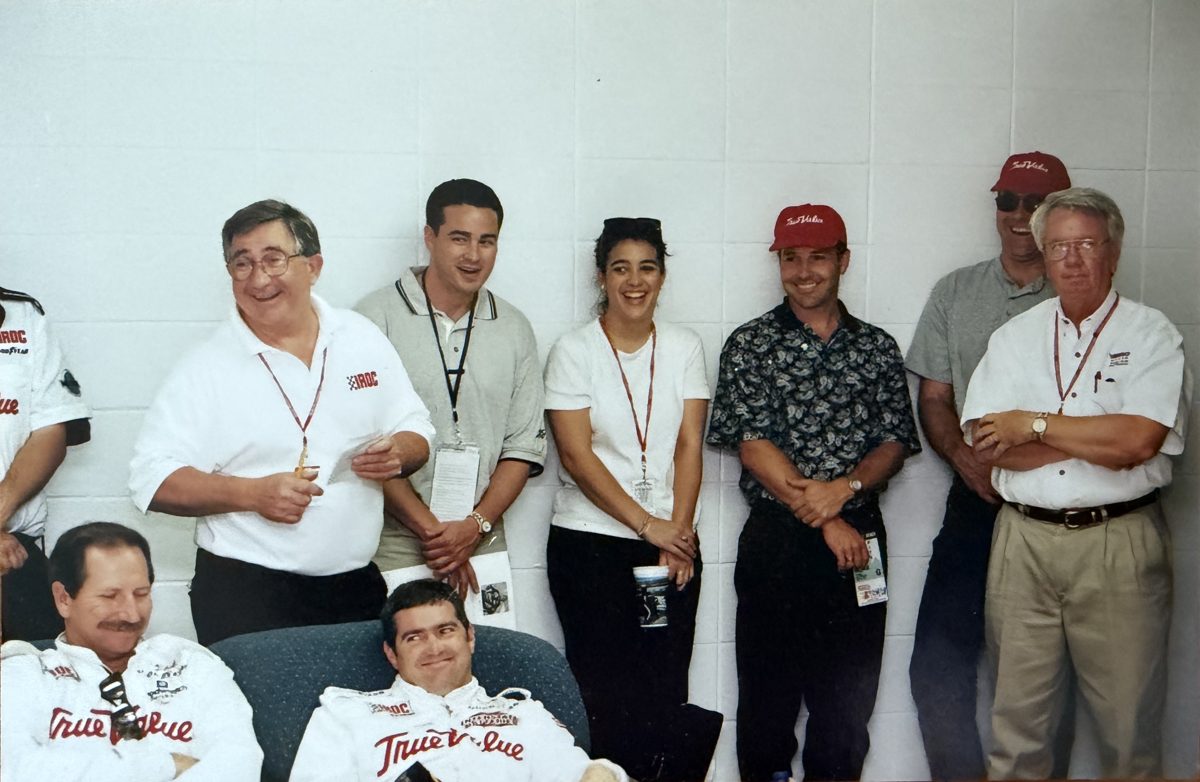 People smiling and laughing together during a drivers meeting